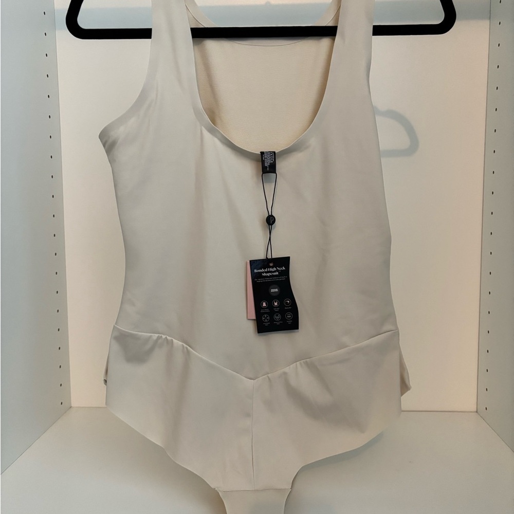NWT Pinsy Cream Highneck Bodysuit